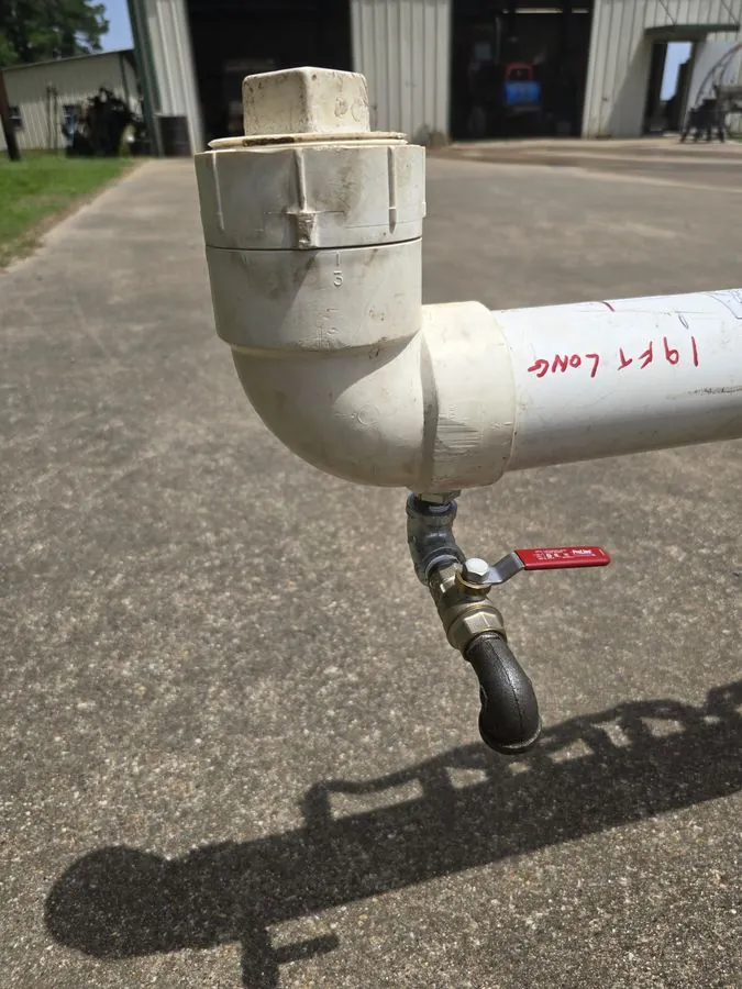 Filler cap and drain valve on the SkidWick 5-gallon herbicide reservoir