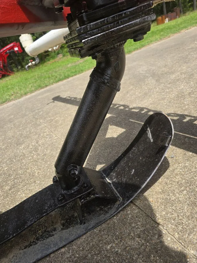 Height-adjustable skid leg rotating on sealed bearings